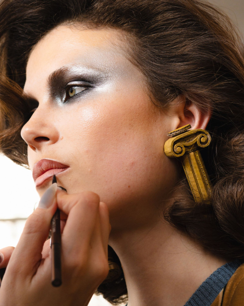 Closeup of Georgina Sherrington with Reflective lids makeup.